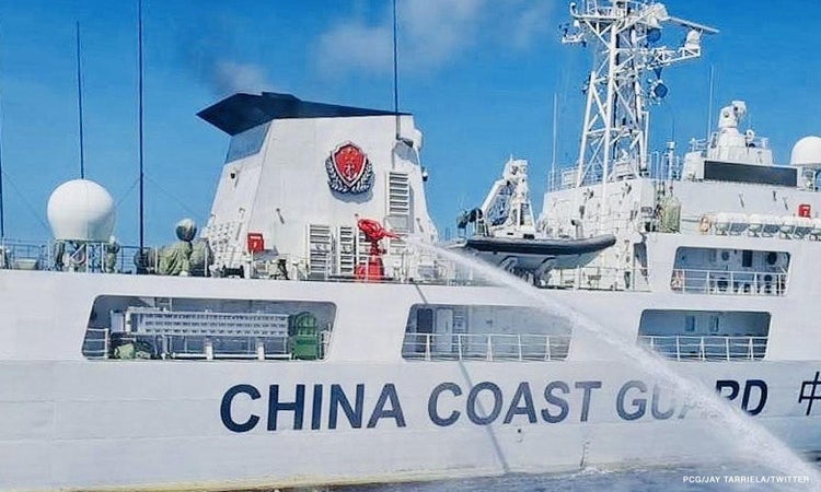 chinese embassy - china coast guard firing water canon to philippine boat
